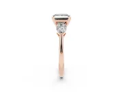 Fancy Black Three-Stone Princess Cut Diamond Ring Set in Rose gold with Pear Side Stones and Prong Setting