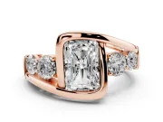 Radiant Cut Diamond Bezel Bypass Ring Set in Rose gold with Round Accents