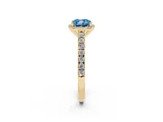 Fancy Blue Cushion Cut Diamond Halo Engagement Ring Set in Yellow gold with Pavé Band and Prong Setting