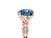 Fancy Blue Heart Cut Diamond Solitaire Ring Set in Rose gold with Bezel-Set Accents on Beaded Band and Prong Setting