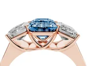 Emerald Cut Three Stone Engagement Ring Setting for a Fancy Blue Lab-Grown Diamond | Basket Prong Heads | Rose Gold