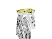 Fancy Yellow Pear Cut Diamond Solitaire Ring Set in Platinum with Layered Twist Pavé Band