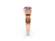 Fancy Pink Three-Stone Heart Cut Diamond Channel Set Ring Set in Rose gold with Bar Prongs