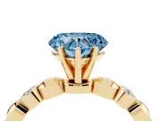 Fancy Blue Heart Cut Diamond Solitaire Ring Set in Yellow gold with Bezel-Set Accents on Beaded Band and Prong Setting