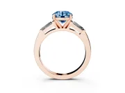 Fancy Blue Round Cut Diamond Solitaire Ring Set in Rose gold with Tapered Baguette Side Stones and Prong Setting