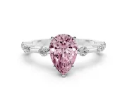 Fancy Pink Pear Cut Diamond Solitaire Ring Set in Platinum with Bezel Set Side Stones and Prong Setting