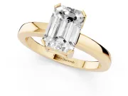 Emerald Cut Diamond Solitaire Ring Set in Yellow gold with Prong Head and Smooth Polished Band