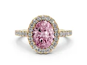 Fancy Pink Oval Cut Diamond Halo Pavé Solitaire Ring Set in Yellow gold with Prong-Set Center Stone