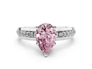 Fancy Pink Pear Cut Diamond Solitaire Ring Set in Platinum with Channel Set Band and Prong Setting