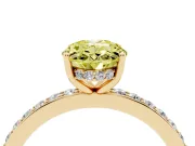Fancy Yellow Oval Cut Diamond Pavé Band Ring Set in Yellow gold with Prong-Set Center Stone