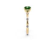 Fancy Green Cushion Cut Diamond Solitaire Ring Set in Yellow gold with Bezel Set Side Stones and Prong Setting