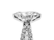 Marquise Cut Diamond Three-Stone Ring Set in Platinum with Pavé Split Shank and Prong Setting