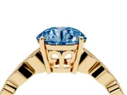 Fancy Blue Round Cut Diamond Solitaire Ring Set in Yellow gold with Infinity Twist Pavé Band