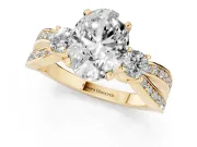 Three-Stone Oval Cut Diamond Twist Band Ring Set in Yellow gold with Pavé Accents and Prong Setting