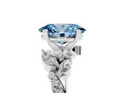 Fancy Blue Oval Cut Diamond Solitaire Ring Set in Silver with Marquise Twist Band and Prong Setting