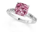 Fancy Pink Cushion Cut Diamond Solitaire Set in Platinum with Side Baguettes and Channel Set Band