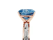 Fancy Blue Radiant Cut Diamond Solitaire Ring Set in Rose gold with Channel-Set Baguette Band and Prong Setting