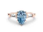 Fancy Blue Pear Cut Diamond Solitaire Ring Set in Rose gold with Tapered Baguette Accents and Prong Setting