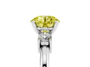 Fancy Yellow Three-Stone Round Cut Diamond Ring Set in White gold with Prong Setting and Plain Band