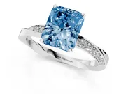 Fancy Blue Radiant Cut Diamond Engagement Ring Set in White gold with Side Stone Accents and Prong Setting