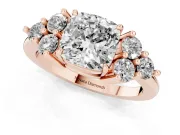 Cushion Cut Diamond Solitaire Ring Set in Rose gold with Cluster Accents on Each Side