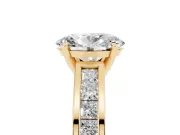 Oval Cut Diamond Solitaire Ring Set in Yellow gold with Channel-Set Band and Prong Setting