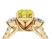 Fancy Yellow Three-Stone Cushion Cut Diamond Pavé Band Ring Set in Yellow gold with Prong-Set Trio