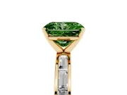 Fancy Green Radiant Cut Diamond Solitaire Ring Set in Yellow gold with Channel-Set Baguette Band and Prong Setting