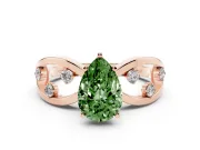 Fancy Green Pear Cut Diamond Solitaire Ring Set in Rose gold with Side Stones on Criss-Cross Band and Prong Setting