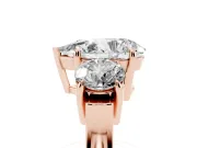 Pear-Shaped Three Stone Engagement Ring Setting | Round Side Stones and Open Baskets | Rose Gold
