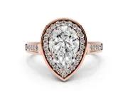 Pear Cut Diamond Halo Solitaire Ring Set in Rose gold with Pavé Band and Bezel Setting