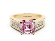 Fancy Pink Asscher Cut Diamond Solitaire Ring Set in Yellow gold with Channel-Set Accent Stones and Prong Setting