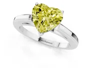 Fancy Yellow Heart Cut Diamond Solitaire Ring Set in Platinum with Prong Setting and Classic Band