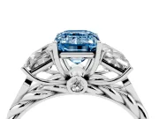 Fancy Blue Emerald Cut Diamond Three-Stone Ring Set in Silver with Braided Band