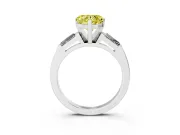 Fancy Yellow Heart Cut Diamond Solitaire Ring Set in Silver with Tapered Baguette Side Stones and Prong Setting