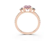 Fancy Pink Oval Cut Diamond Three-Stone Ring Set in Rose gold with Pavé Band and Graduated Sides