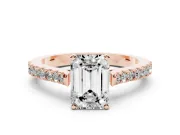 Emerald Cut Diamond Solitaire Engagement Ring Set in Rose gold with Delicate Pavé Band and Prong Setting