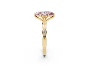 Fancy Pink Marquise Cut Diamond Solitaire Twisted Band Ring Set in Yellow gold with Accent Stones and Prong Setting