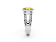 Fancy Yellow Oval Cut Diamond Halo Ring Set in White gold with Pavé Split Shank and Prong Setting