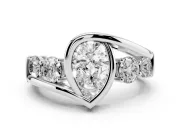 Pear-Shaped Bezel Bypass Engagement Ring Setting | Round Side Stones | White Gold