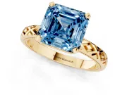 Fancy Blue Asscher Cut Diamond Solitaire Ring Set in Yellow gold with Milgrain and Black Enamel X Pattern Band