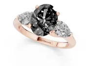 Oval Three-Stone Engagement Ring Setting for a Black Center | Pear Side Stones | Rose Gold
