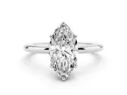 Marquise Cut Diamond Solitaire Ring Set in White gold with Thin Band and Prong Setting