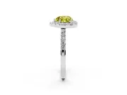 Fancy Yellow Heart Cut Diamond Halo Pavé Solitaire Ring Set in White gold with Prong-Set Center Stone
