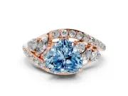 Fancy Blue Heart Cut Diamond Halo Ring Set in Rose gold with Marquise and Pavé Band in Prong Setting