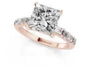 Princess Cut Diamond Solitaire Set in Rose gold with Side Baguettes and Channel Set Band