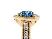 Fancy Blue Heart Cut Diamond Halo Ring Set in Yellow gold with Round Accent Halo, Pavé Band and Prong Setting