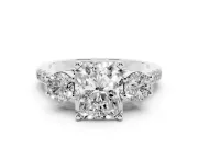 Three-Stone Radiant Cut Diamond Pavé Band Ring Set in White gold with Prong-Set Trio