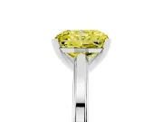 Fancy Yellow Radiant Cut Diamond Solitaire Ring Set in White gold with Prong Setting and Classic Band