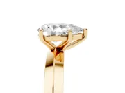 Pear Cut Diamond Solitaire Engagement Ring Set in Yellow gold with Flat Band and Prong Setting